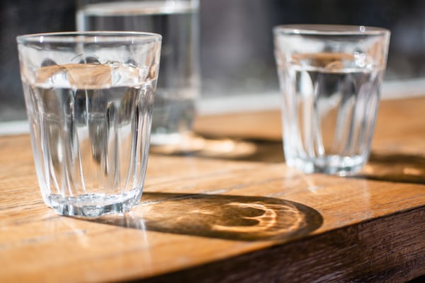 3 glasses of water on a table