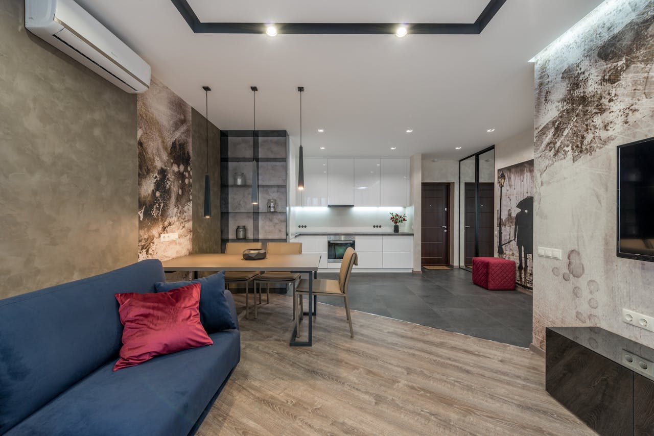 Modern apartment, livingroom, kitchen combo. Image by Pexels