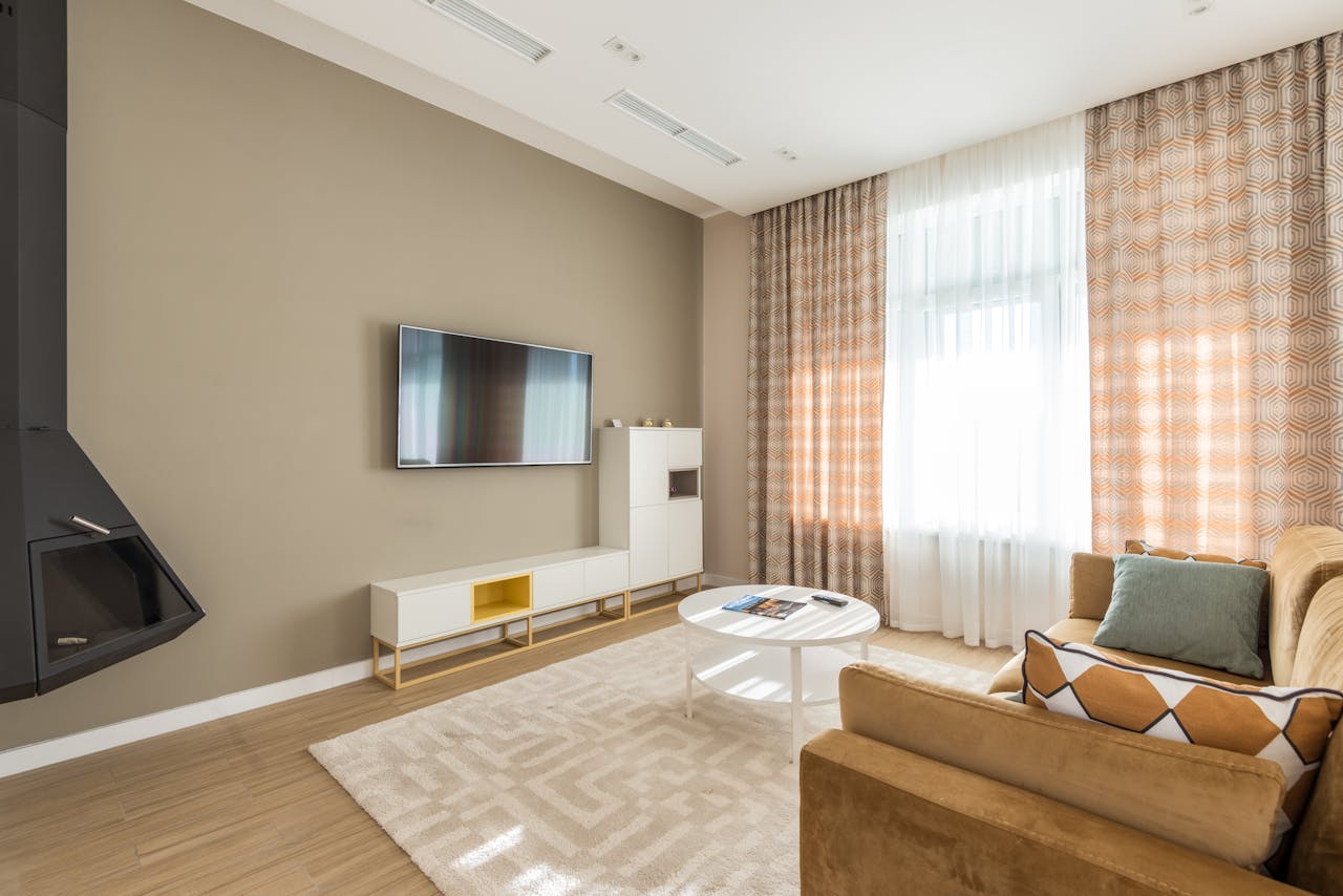Livingroom with natural light from the window. Image by Pexels