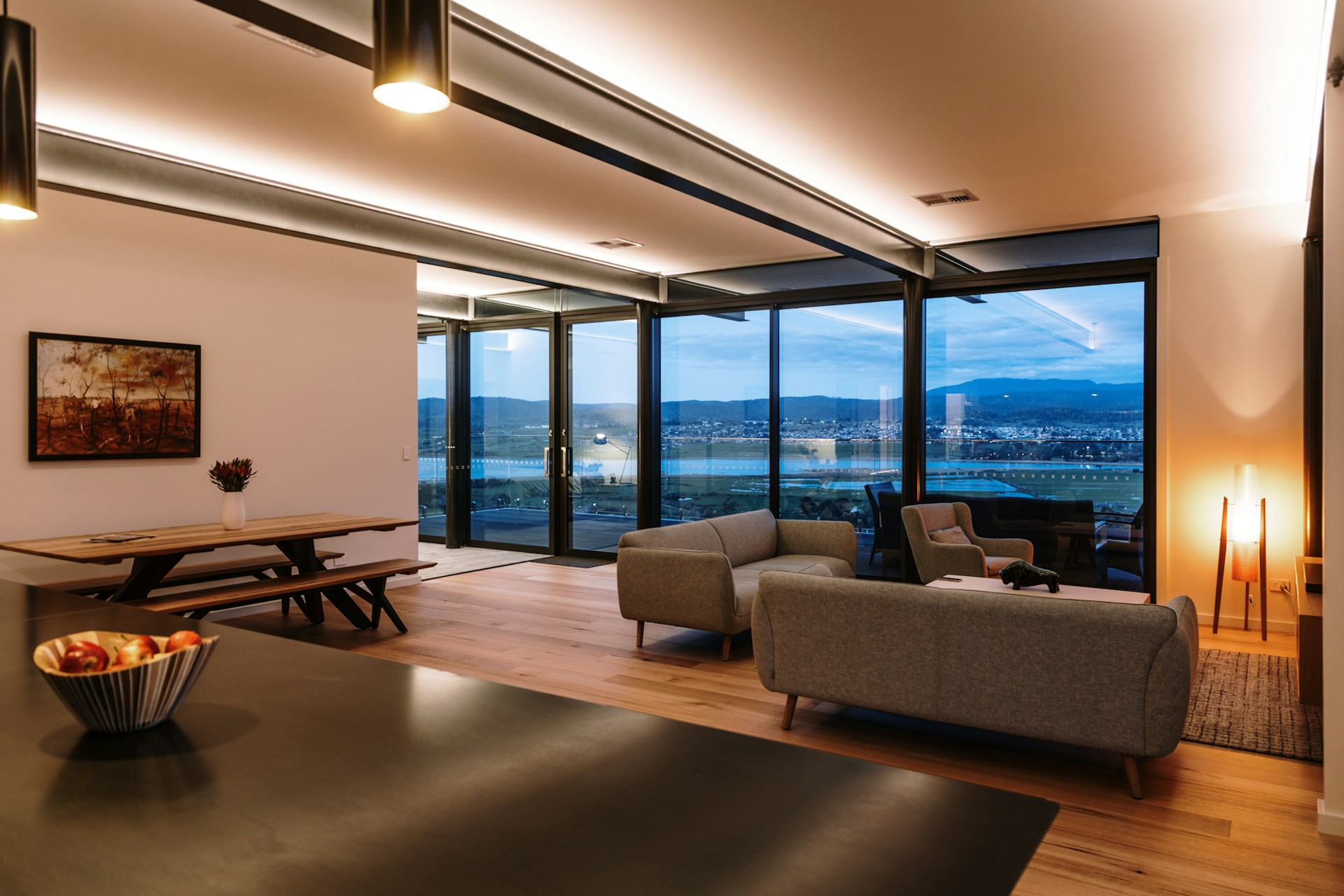 Livingroom with large windows. Image by Unsplash