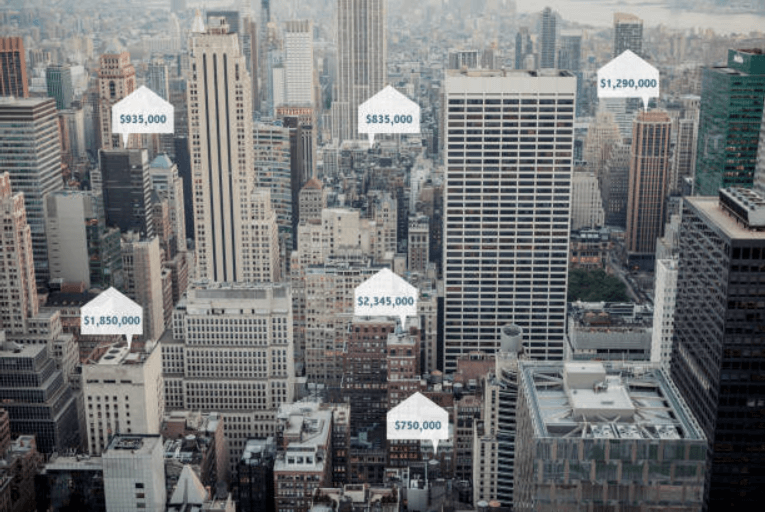 A white and red modern house with a clean exterior. Image by Unsplash