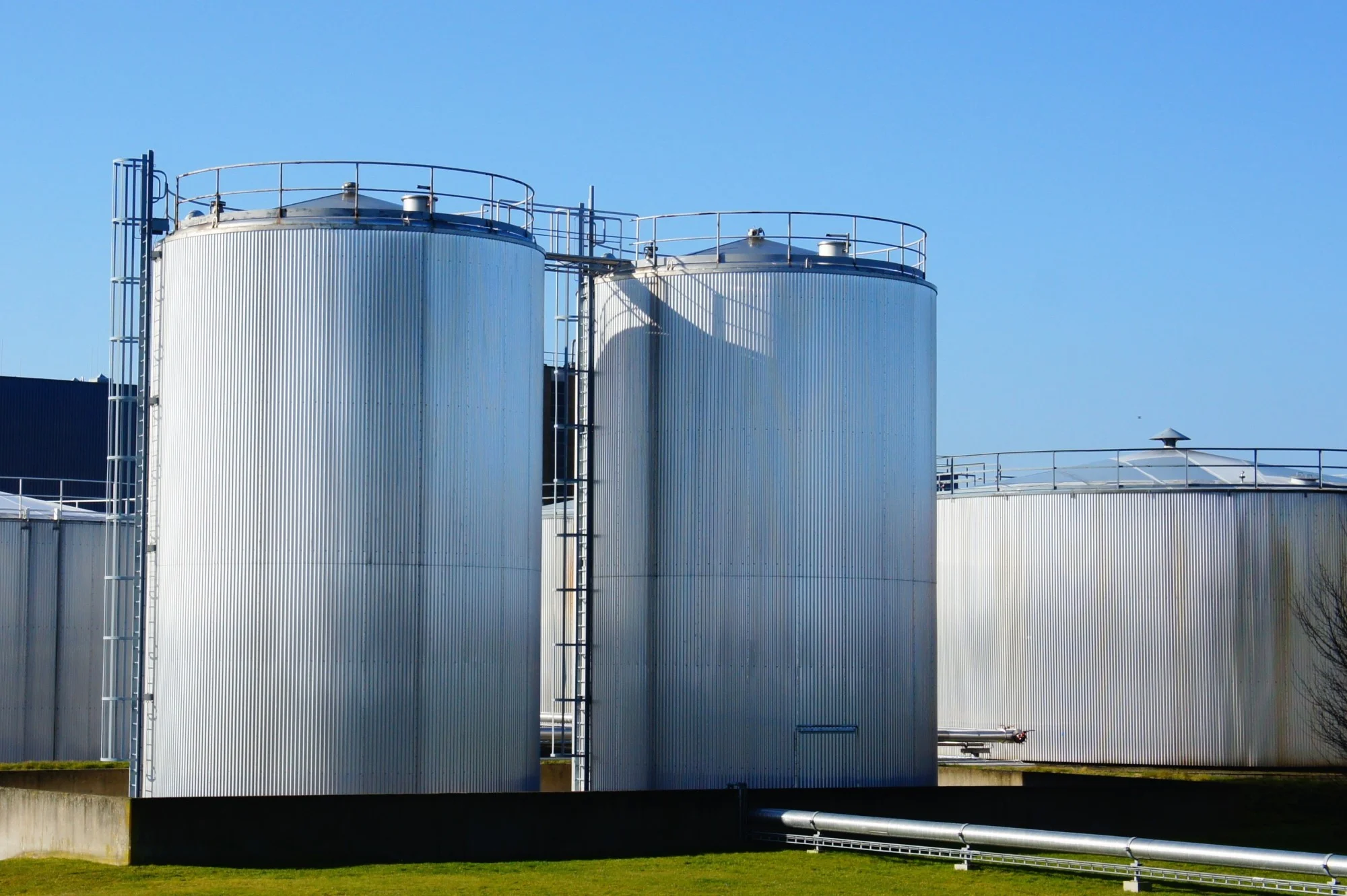 Large storage tanks, blue sky