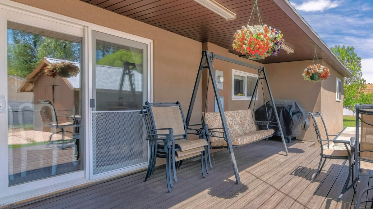 Outdoor patio with furniture.
