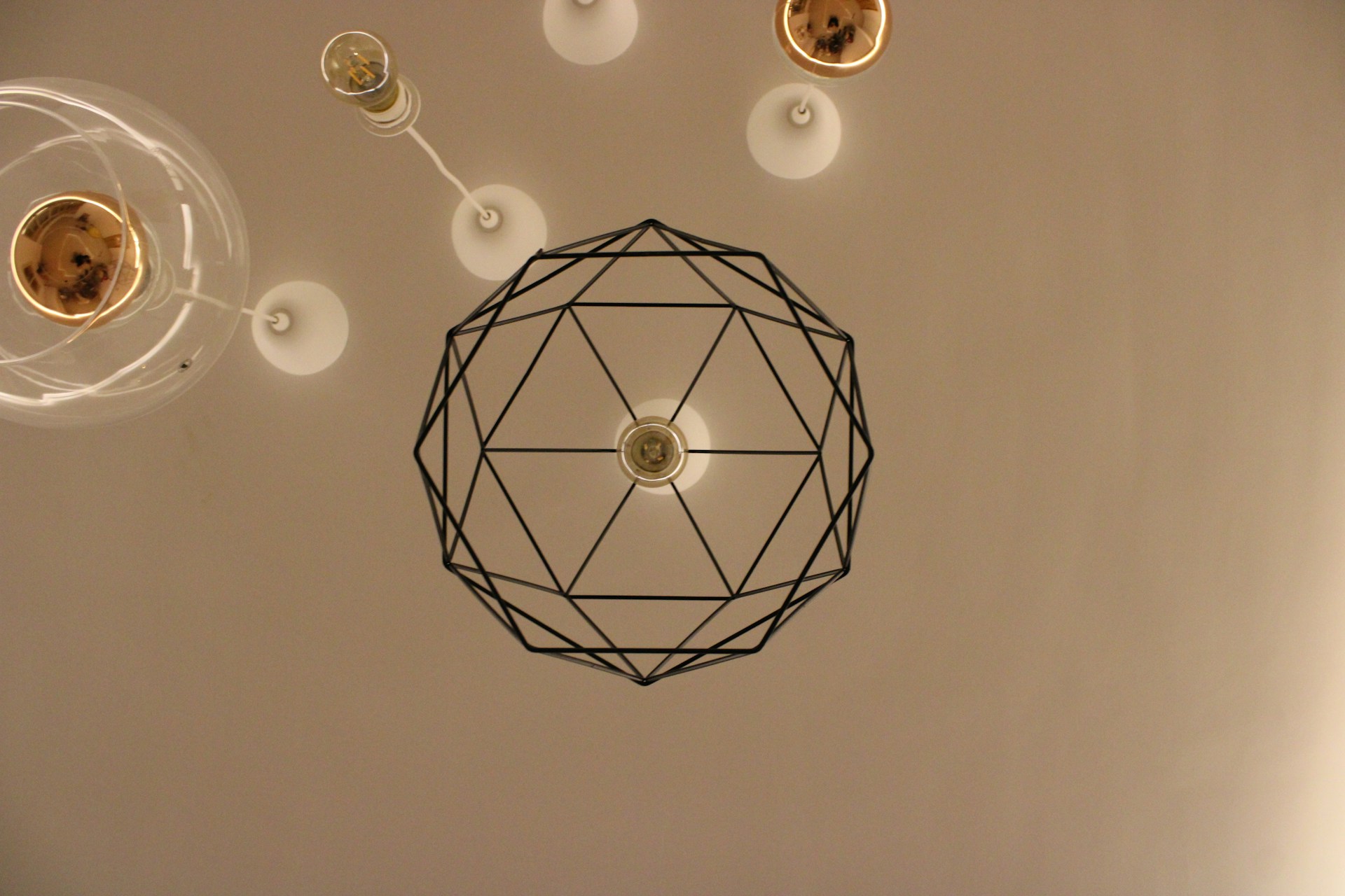 White and black ceiling lamps. Image by Unsplash