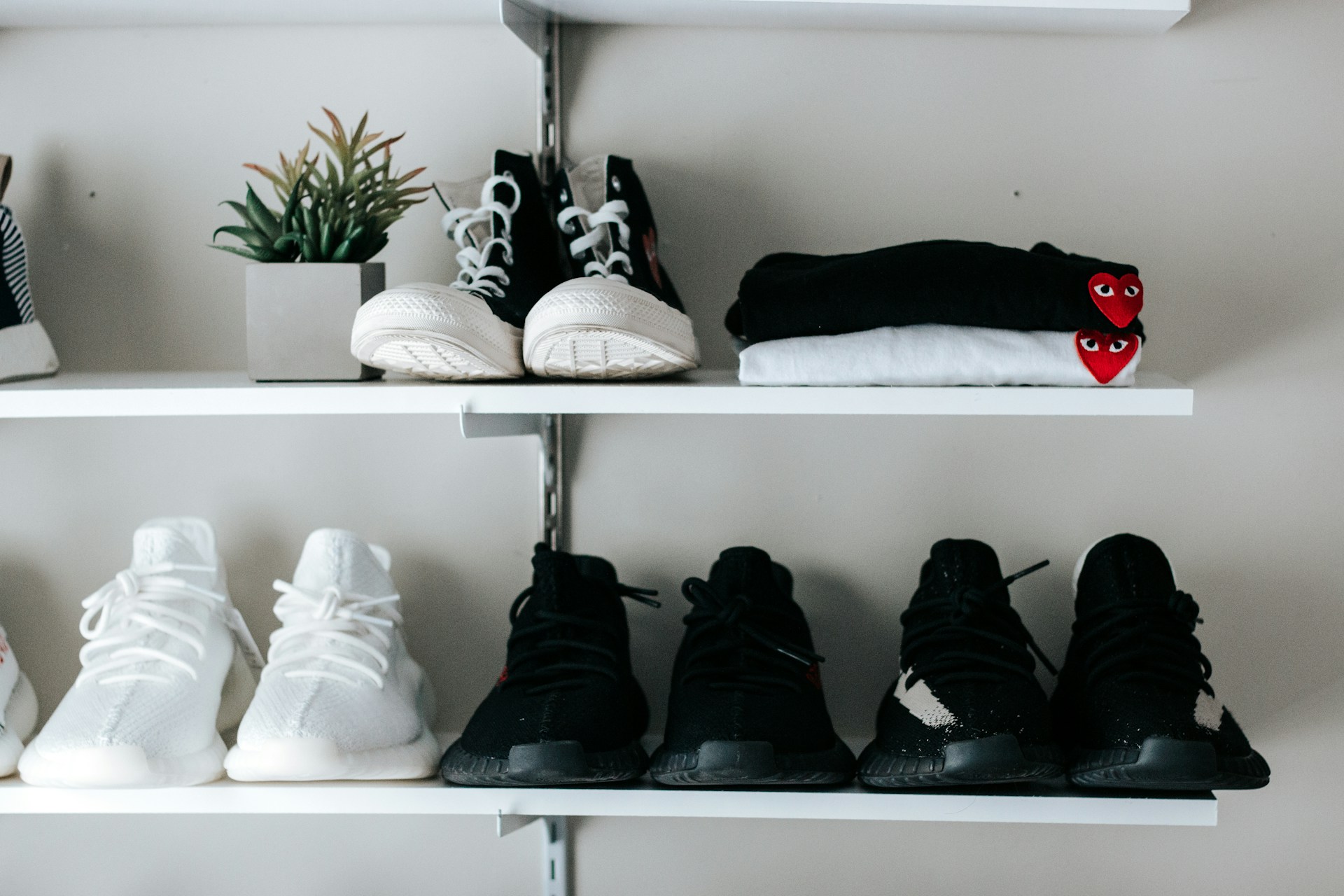 Shoes on white floating shelves