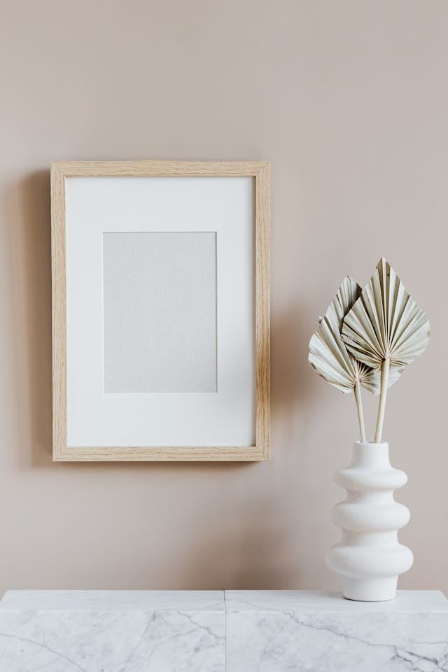 Empty frame on a wall. Image by Pexels
