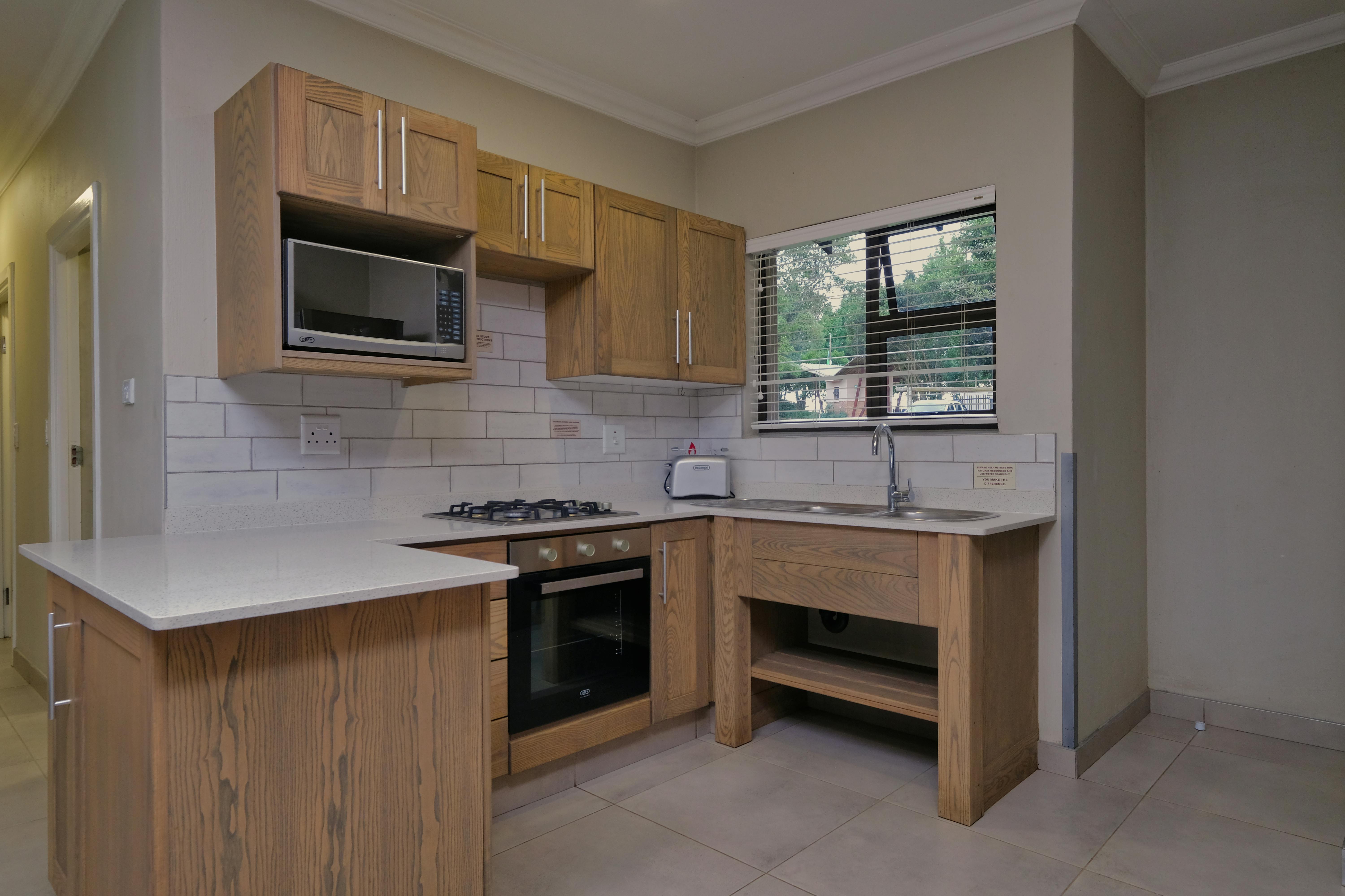 Small modern kitchen. Image by Pexels