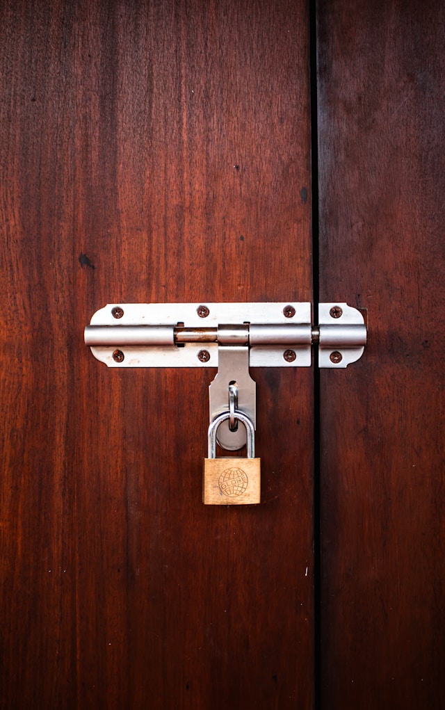 Padlock on a door. Image by Unsplash