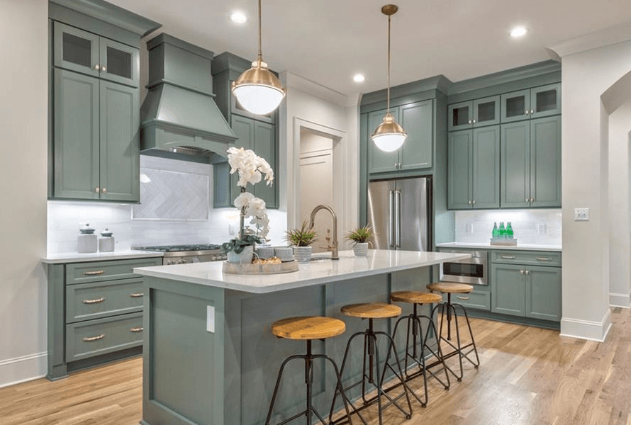 Modern kitchen with green cabinets