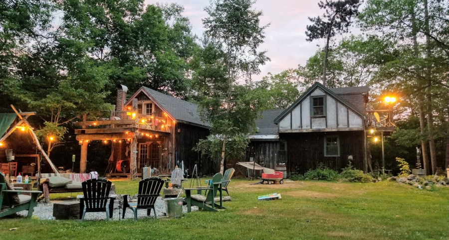backyard sitting area, lights on house